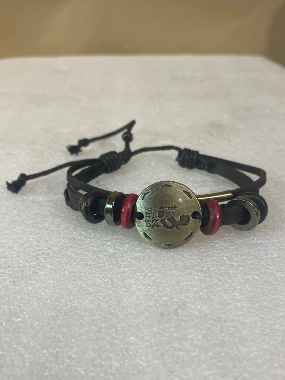 Adjustable Black Leather Bracelet with Red Accents and Antique Brass Disc